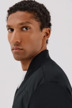 Cortefiel Camisolas|Casacos--Regular fit-Fleece fabric combined with technical fabric-Front zip fastening, bomber neck and side pockets-By buying our cotton products, you're supporting our investment in the Better Cotton initiative. This product has been sourced using Preto