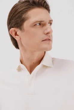 Cortefiel Polos|Camisolas--Regular fit-Piqué fabric-Long sleeve, placket with buttons and embroidered logo on the chest-Shirt cuffs with button-By buying our cotton products, you're supporting our investment in the Better Cotton initiative. This product has bee Ecru